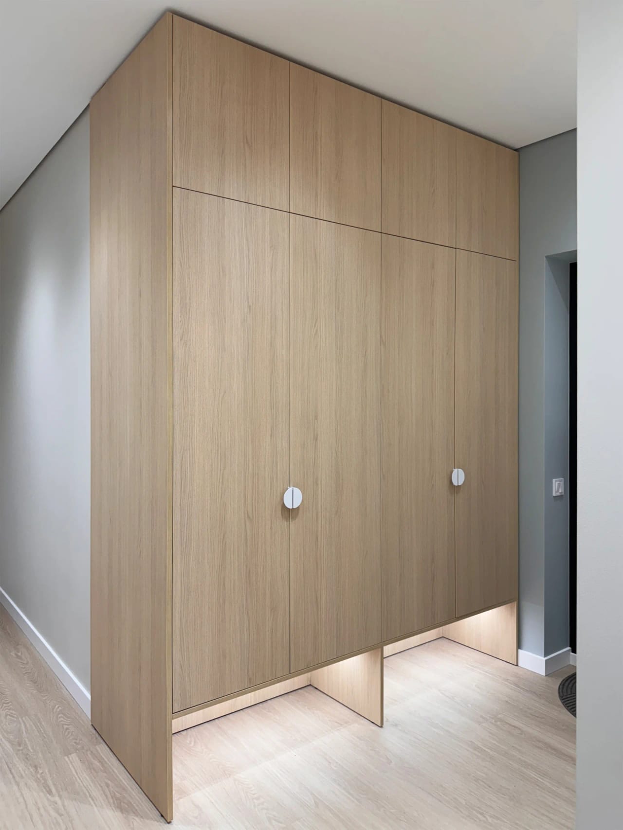 Maelis apartment — sage kitchen and oak built-ins — 1