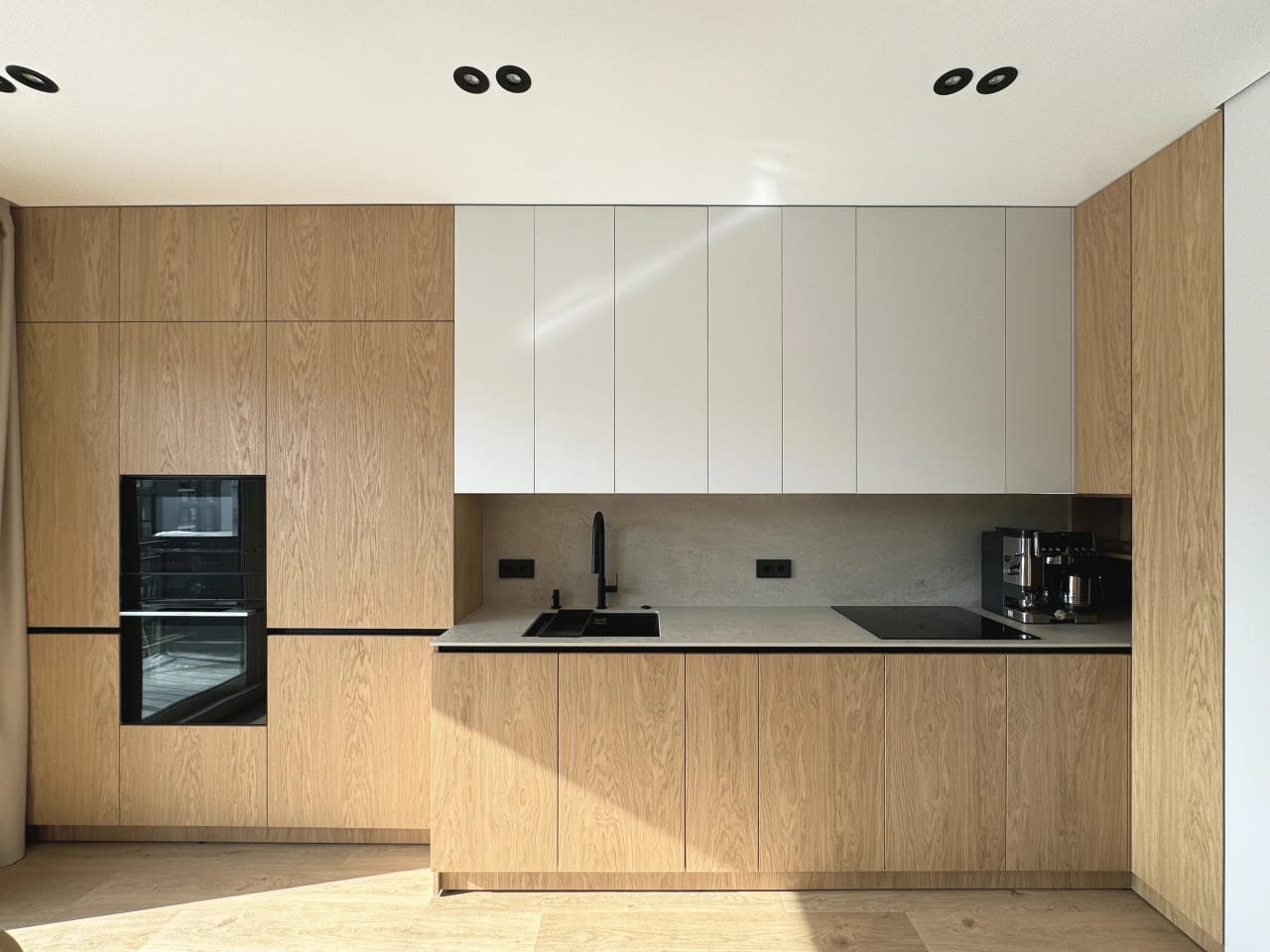 Orelle apartment — oak kitchen, island and built-ins